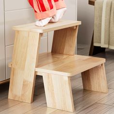 a child's chair and stool made out of plywood
