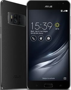 the asus phone is shown in black and has an extra battery cover on it