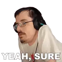 a man wearing glasses and headphones says " yeah sure "