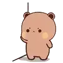 a brown teddy bear is holding a stick in his hand and standing next to a skateboard .